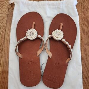 Chic Brown Sandals with Floral Accent
